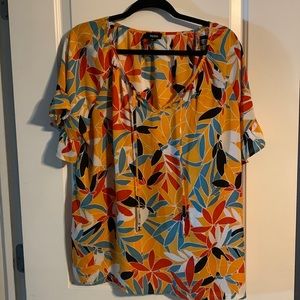 Orange floral blouse